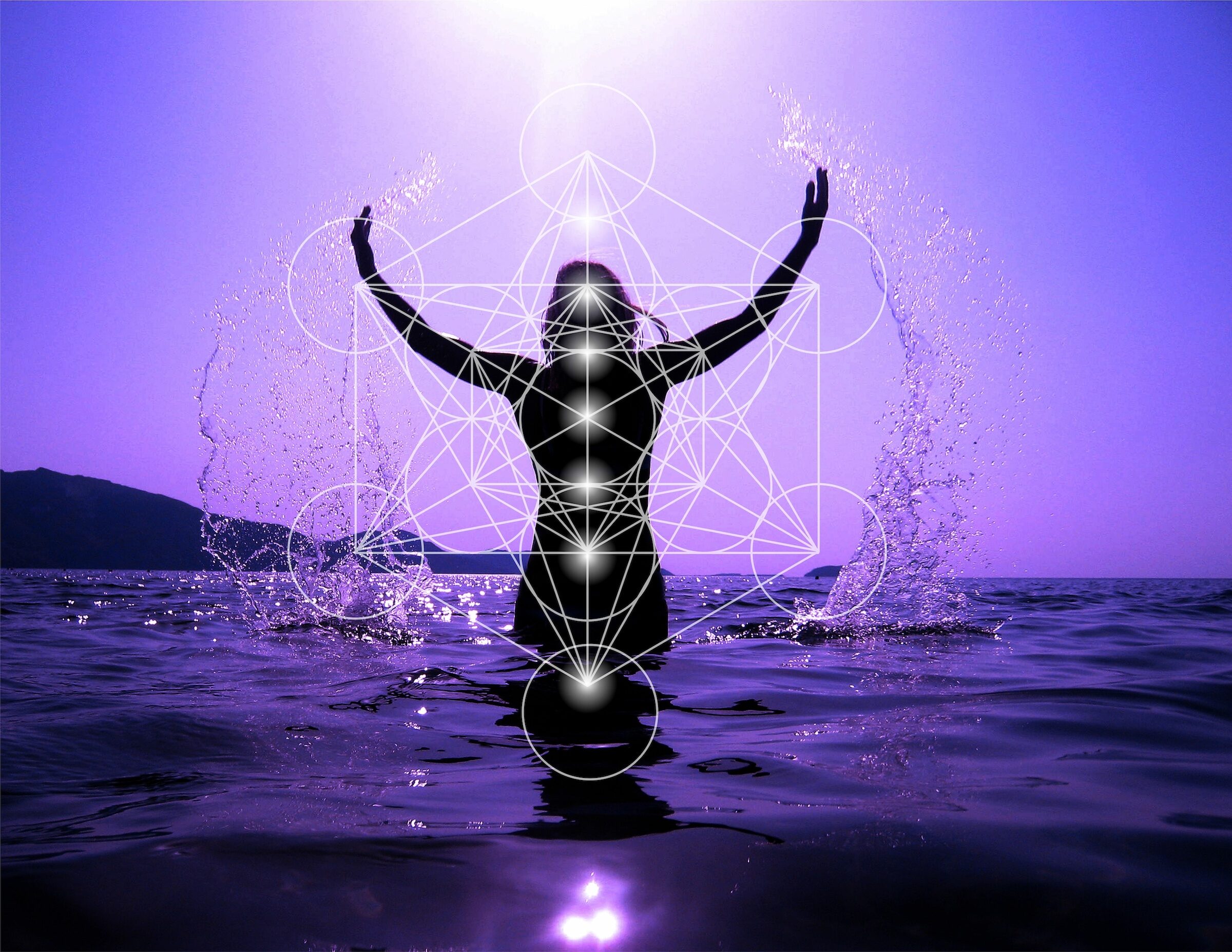 Celebrating life - Woman on the beach at sunset celebrating life with Sacred geometry Metatron's cube and 7 chakras